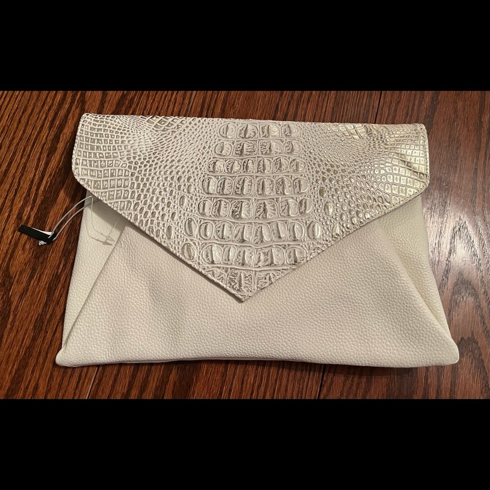 Bebe New leather white and silver clutch